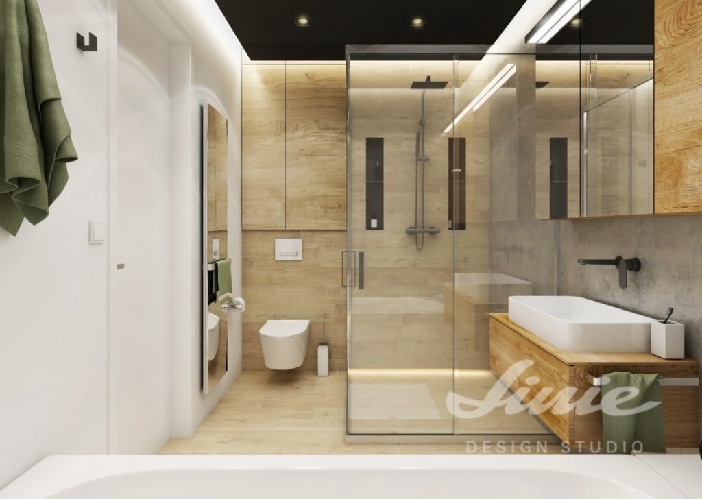 Moderní koupelna s dřevěnými detaily a proskleným sprchovým koutem