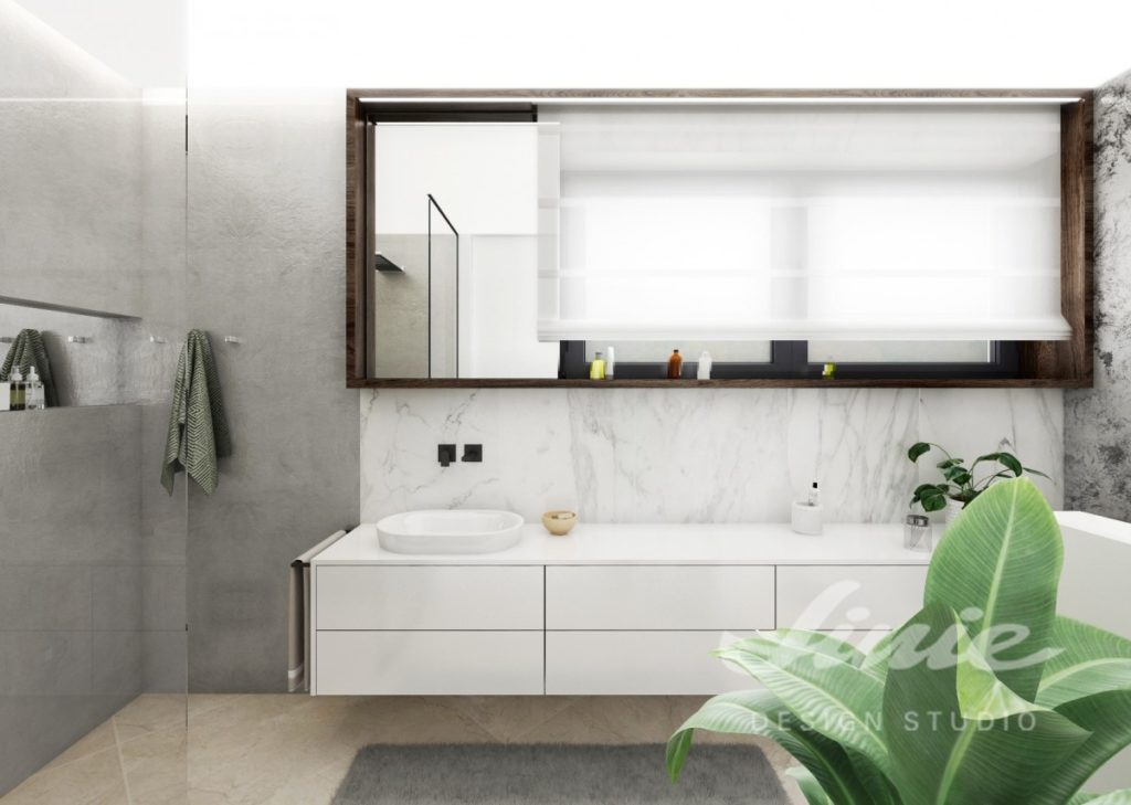 Moderní koupelna s bílými úložnými prostorami