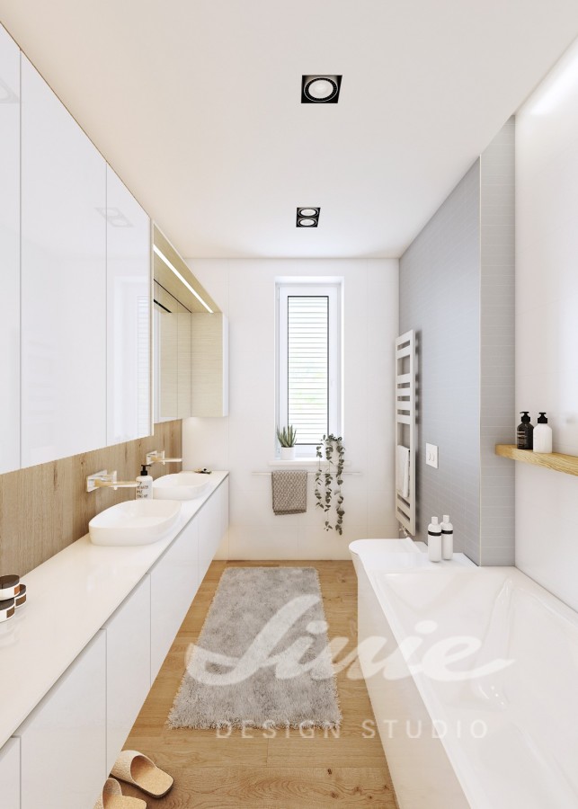 Moderní koupelna zařízena v bílých odstínech