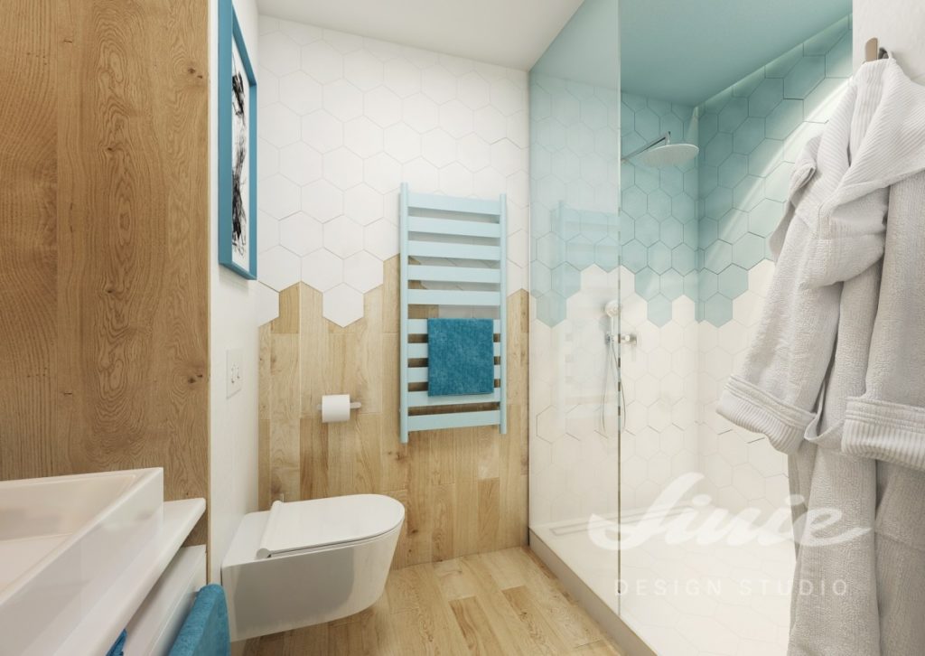Moderní koupelna s topením v pastelově modré barvě